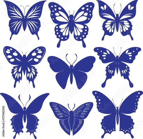 Collection of nine dark blue butterfly silhouettes on a white background