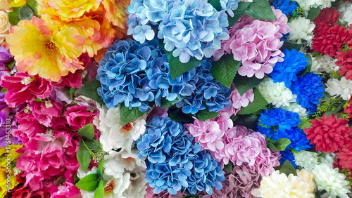 roses, peonies, hydrangeas, designer composition of artificial flowers, floral background in retro style
