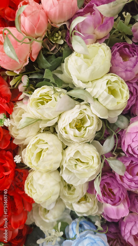 roses,designer composition of artificial flowers, floral background in retro style