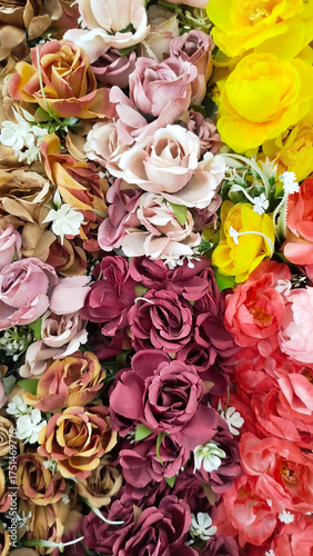 roses,designer composition of artificial flowers, floral background in retro style