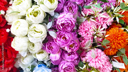 roses,designer composition of artificial flowers, floral background in retro style