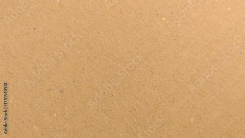 Background of brown kraft paper or cardboard texture. Abstract pattern of beige rough carton, old paper sheet, 