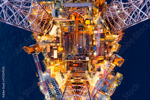 Wallpaper Mural Aerial view of offshore jack up rig and offshore platform during sunset for oil and gas exploration and production. Torontodigital.ca