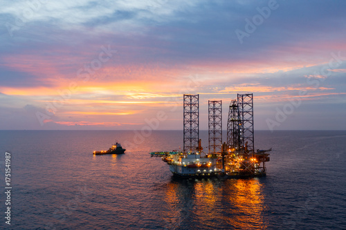 Wallpaper Mural Aerial view of offshore jack up rig and offshore platform during sunset for oil and gas exploration and production. Torontodigital.ca