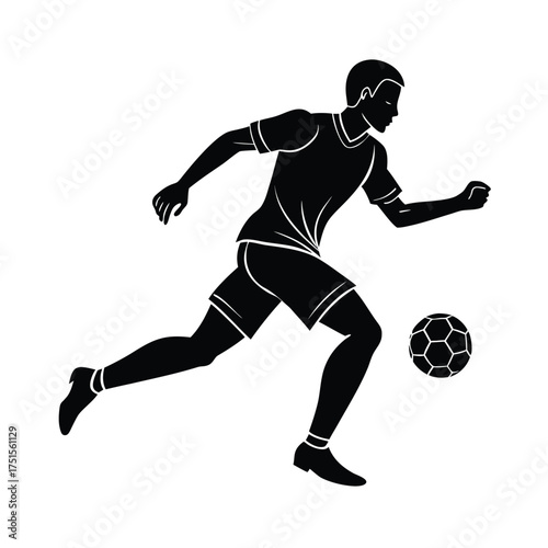 Silhouette of a soccer player dribbling a ball football
