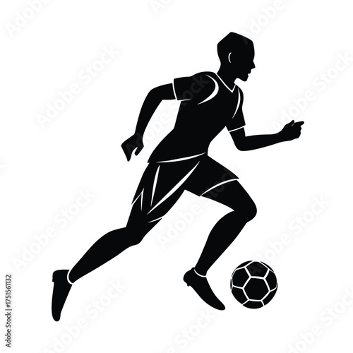 Silhouette of a soccer player dribbling the ball forward