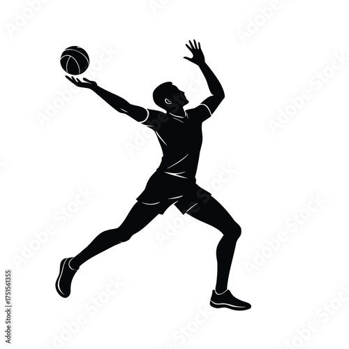 Silhouette of a volleyball player spiking the ball