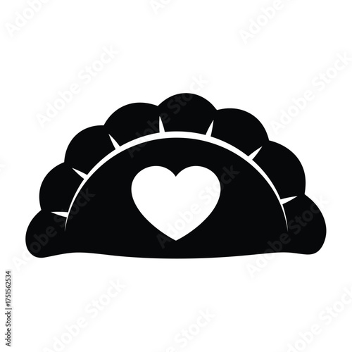 Black dumpling with white heart shape cutout food