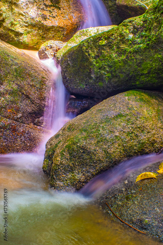 Water Flowing in the forest Waterfall, Thailand.