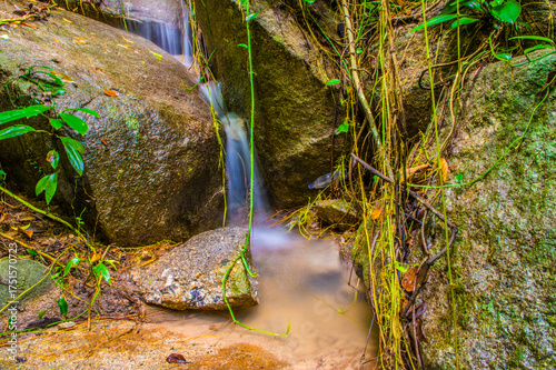 Water Flowing in the forest Waterfall, Thailand.