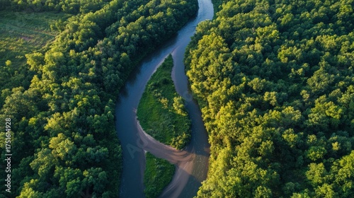 Aerial imagery for river basin management, showing tributaries, water flow patterns, and sediment deposition
