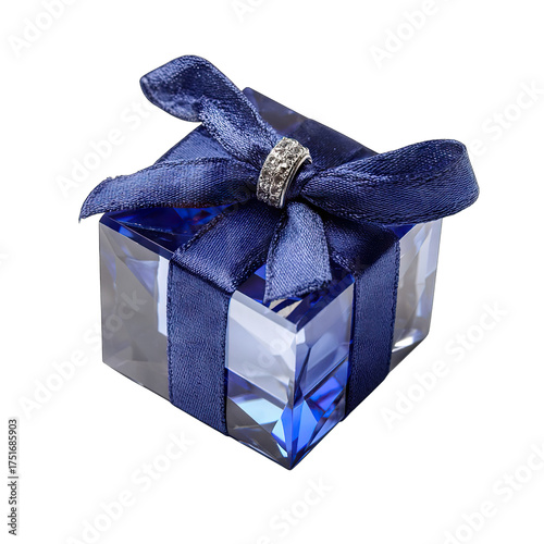A crystal gift box with a blue ribbon and a ring on the bow displayed on a black background surface isolated on transparent background