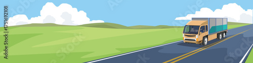 Business of cargo of container truck driving on asphalt road. Landscape view of the road on the green hills. Background of mountain under white clouds and blue sky.
