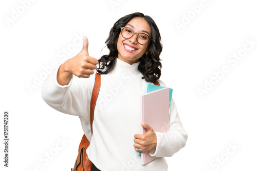 Young Argentinian student woman over isolated background with thumbs up because something good has happened