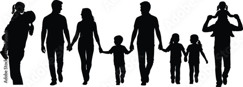 Silhouette of a happy family walking together parents holding hands with their children, creating a heartwarming scene