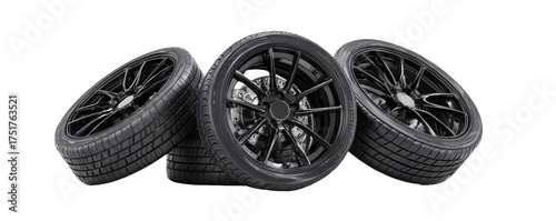 Three black car tires stacked