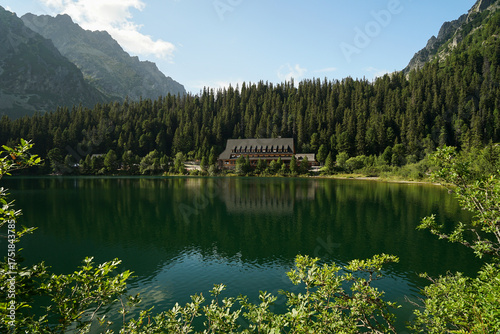 Billede på lærred Popradske Pleso, beautiful glacial lake in High Tatras and mountain hut mirrorin
