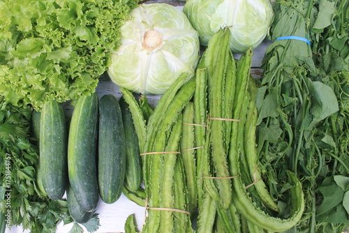 Assorted vegetables on wooden table
