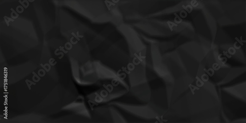 Black crumpled paper texture. Black crumpled paper texture sheet background. Wrinkled paper texture.	