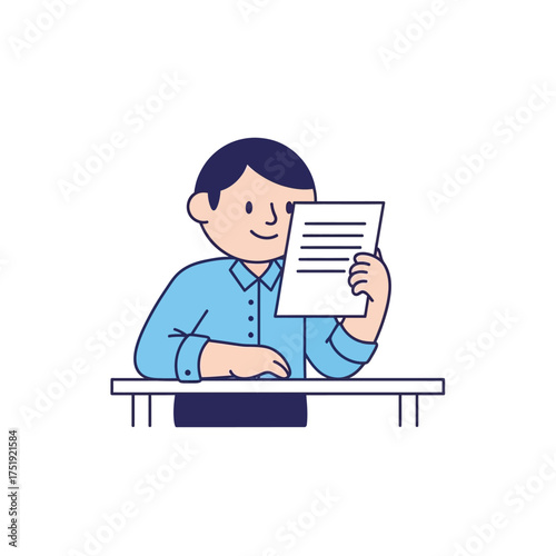 Young man sitting at a desk reading a document.
