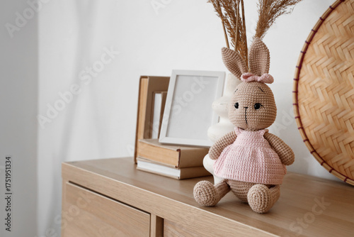 Vase with pampas grass, toy...
