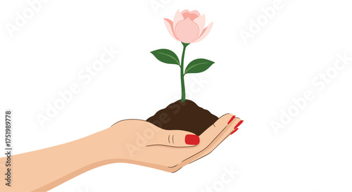 A hand holding soil with a pink flower growing out of it.