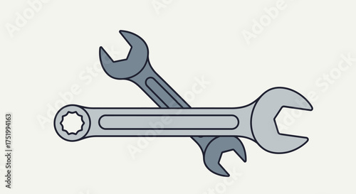 Two Crossed Metal Wrenches with Open and Star-Shaped Ends