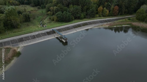 Wallpaper Mural aerial drone view of concrete wall of hydro dam with pump on the lake and forest in the background  Torontodigital.ca