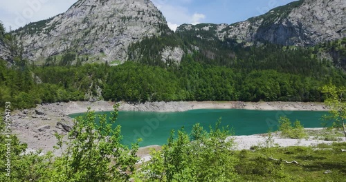 Turquoise Alpine Lake with Rocky Mountains and Forest in Gosau Austria