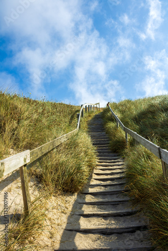 Different vacation impressions from denmark west coast with lighthouse, boats, dunes, footpath, windmills