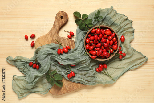 Fresh rose hips in wooden b...