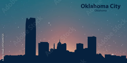 Silhouette of Oklahoma City, Oklahoma, against an evening or morning sky with a gradient from blue to orange. There are also several small white dots imitating stars.