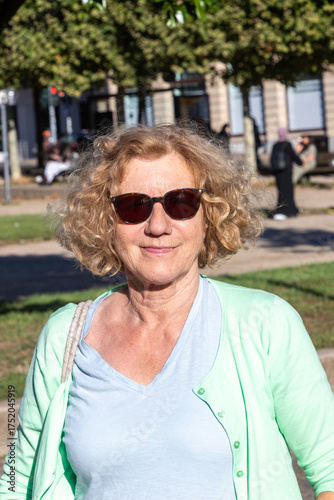 Wallpaper Mural portrait of very attractive mature woman outdoors with natural light Torontodigital.ca
