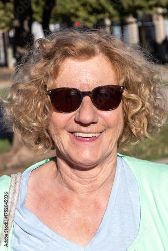 Wallpaper Mural portrait of very attractive mature woman outdoors with natural light Torontodigital.ca