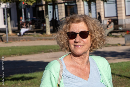 Wallpaper Mural portrait of very attractive mature woman outdoors with natural light Torontodigital.ca