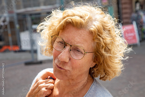 Wallpaper Mural attractive mature senior woman with curly blonde hair Torontodigital.ca