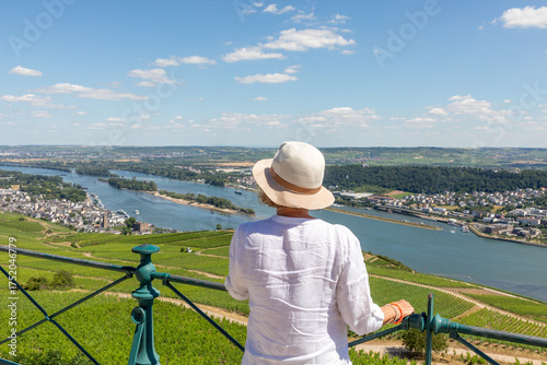 Wallpaper Mural woman enjoys the beautiful view from the platform at Niederwald monument to the river rhine valley Torontodigital.ca