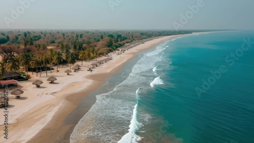 Beach with umbrellas and palm trees