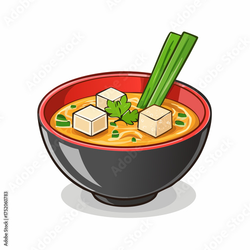 Miso Soup Delight: A beautifully presented bowl of miso soup, a staple of Japanese cuisine, featuring a rich broth, tofu cubes, and fresh garnish.