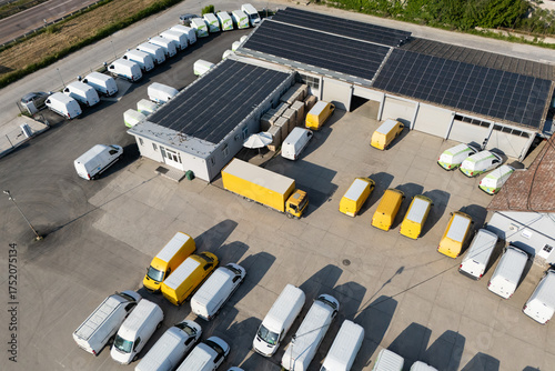 Wallpaper Mural Electric delivery vans and trucks hub using renewable energy. Fleet of electric vehicles Torontodigital.ca