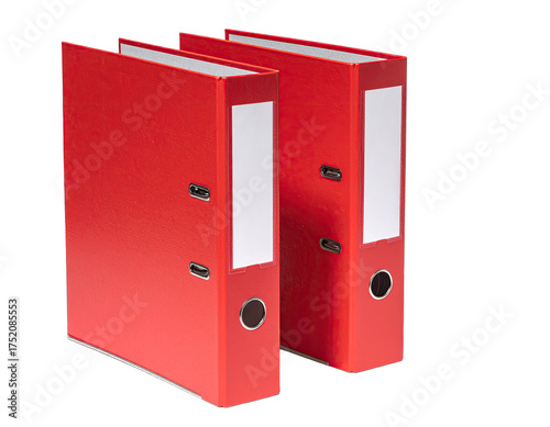 Two red lever arch files stand upright