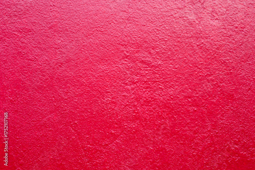 red textured background image of the wall of the home.	
