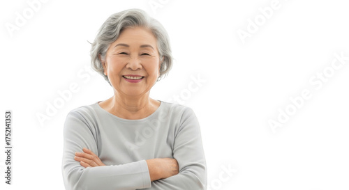 Smiling senior asian woman with arms crossed isolated on transparent background