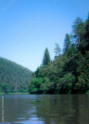 photo of the Ural River. hills and trees around
