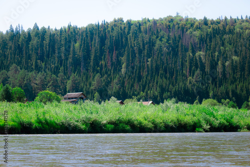photo of the Ural River. hills and trees around