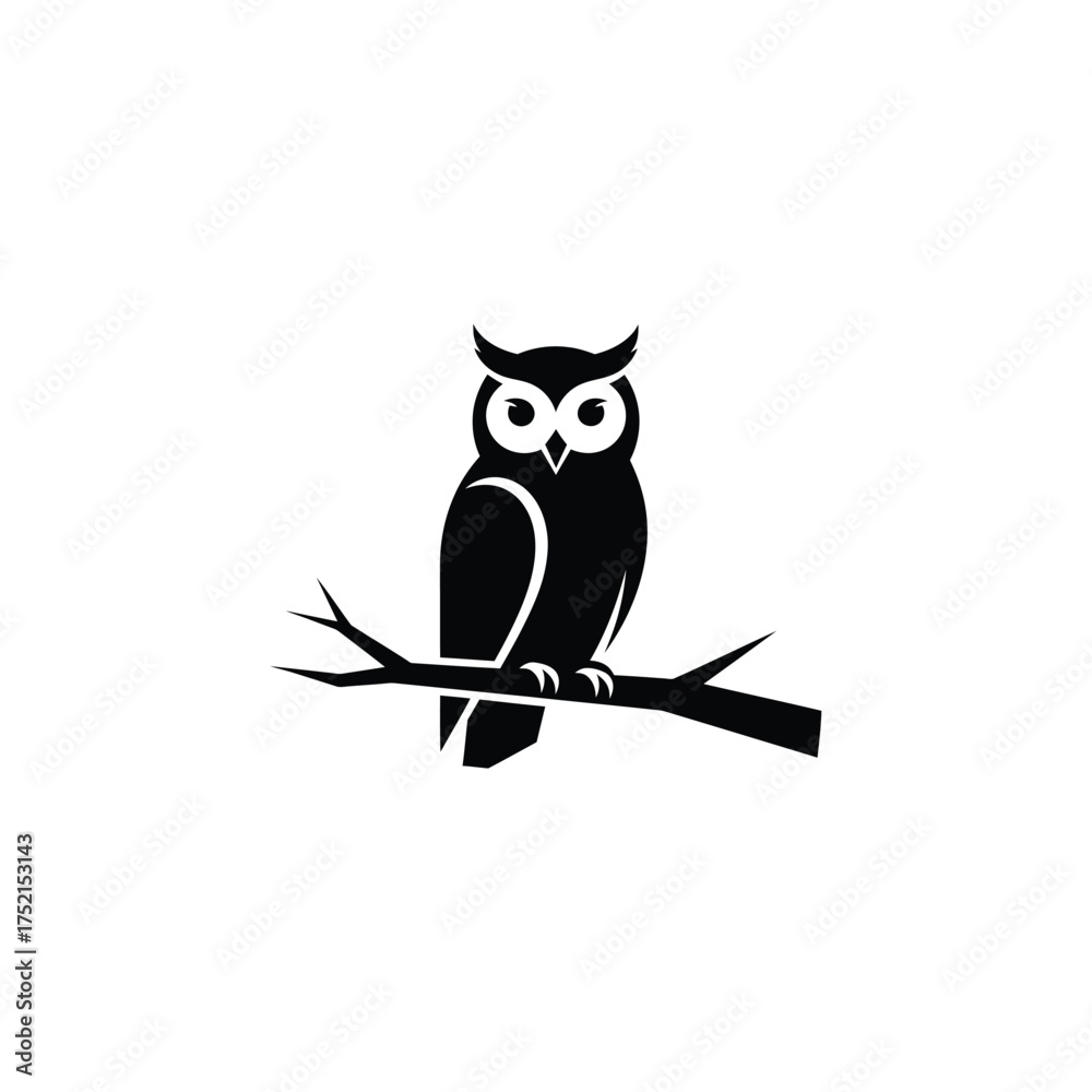 Obraz premium Black owl perched on a branch silhouette