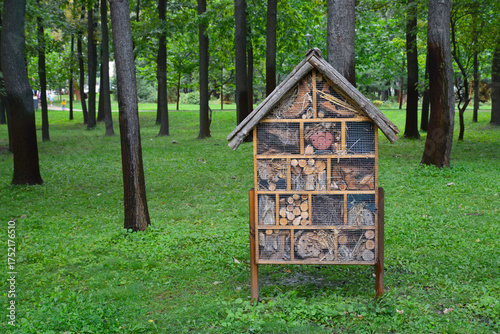 Insect hotel in a city park to protect and preserve pollinators