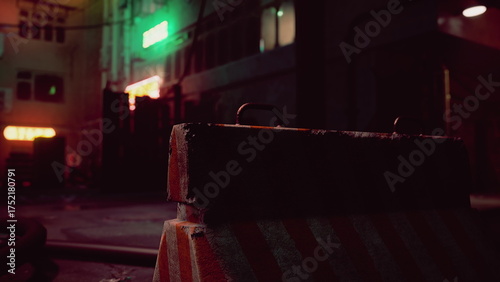 Photos A deserted urban alley captures the glow of neon signs reflecting off wet pavement