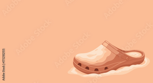 Single brown clog shoe resting on a light surface ready for comfortable wear.