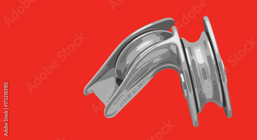 Shiny metal pulley system for sailing boat rigging and rope management.